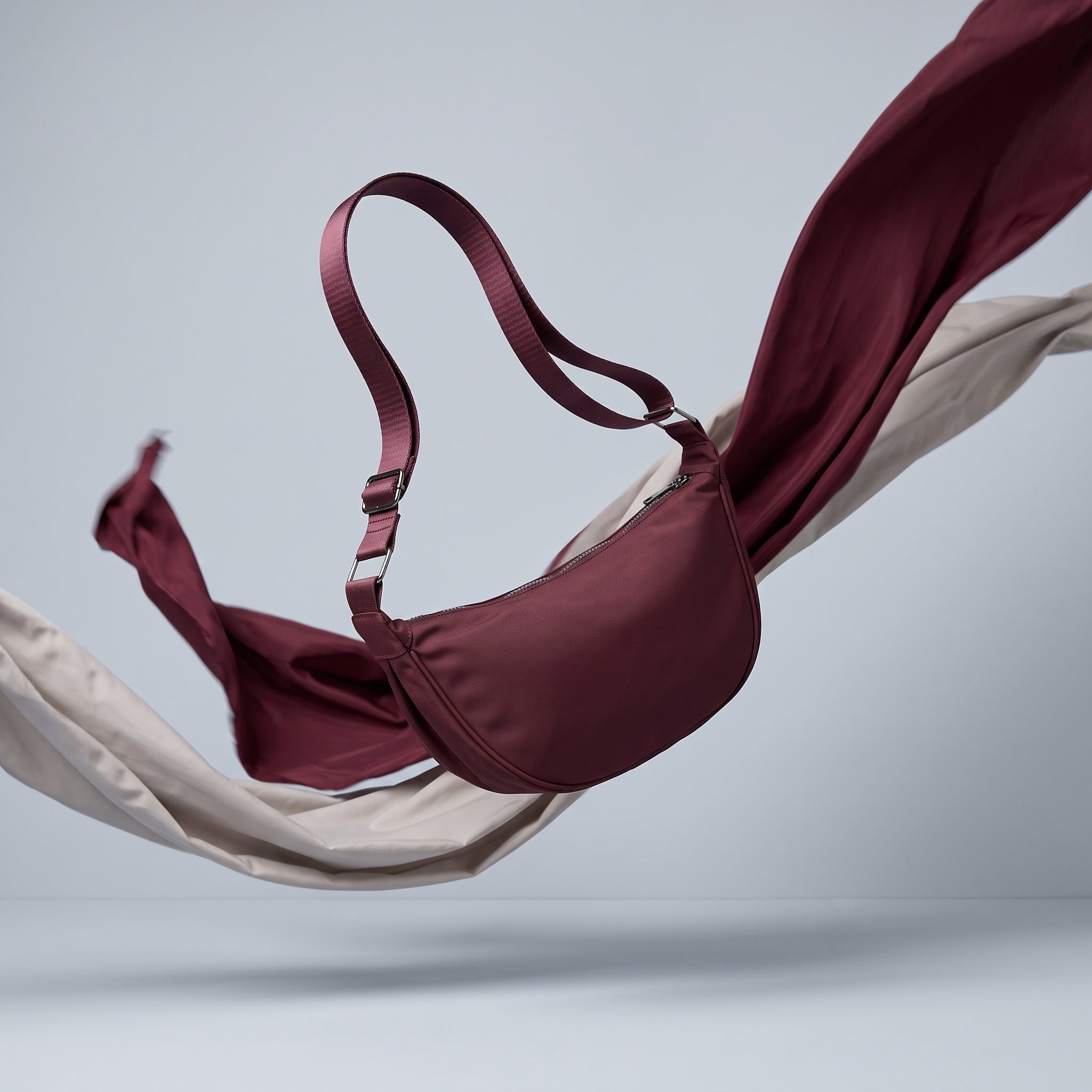 Burgundy_handbag_floating_with_f__202608281525.jpg