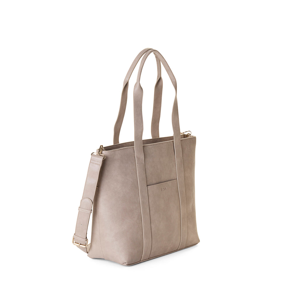 Beige tote bag with shoulder straps on a white background