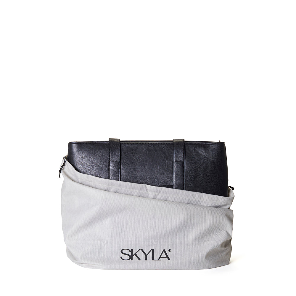 Gray duster bag with 'SKYLA' branding on a white background