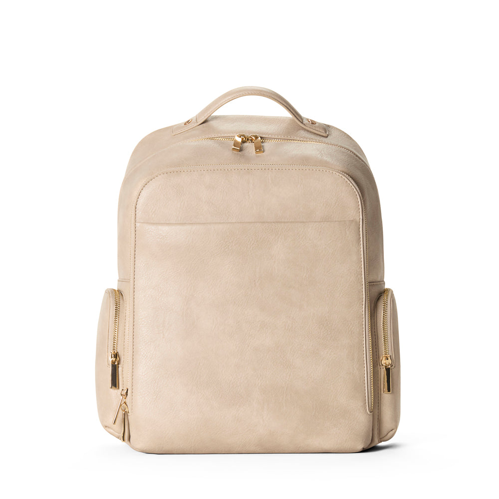 Beige leather backpack with gold zippers on a white background