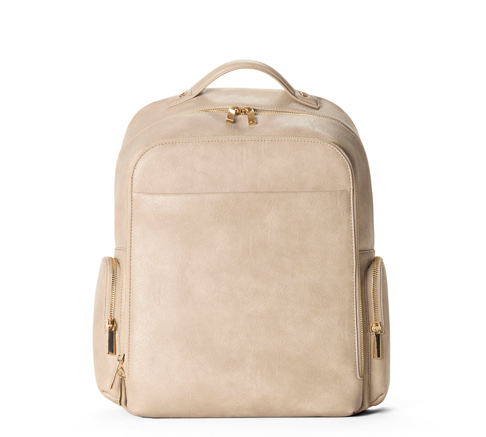 Beige leather backpack with gold zippers on a white background
